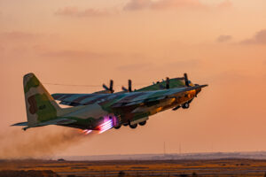 An Israeli Air Force C-130 Hercules "Karnaf" (Rhino) perform rockets assisted take-off (JATO) for short runway takeoff.