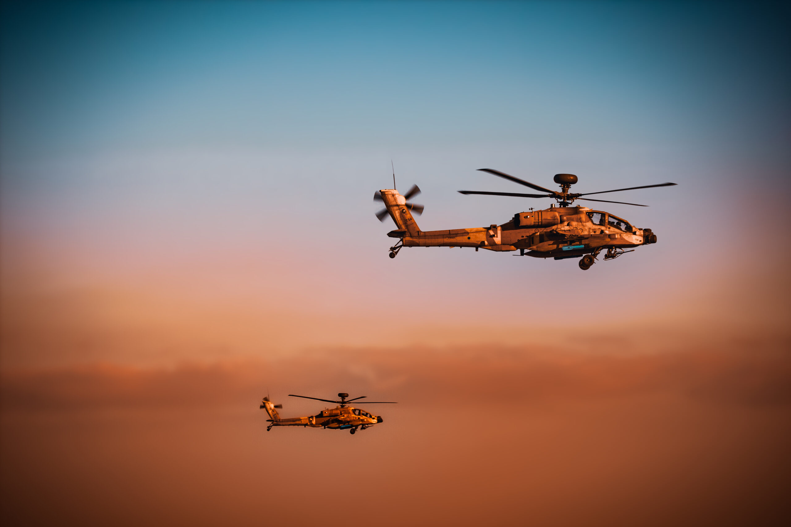 2 Israeli Air Force AH-64D-I "Saraf" in flight.