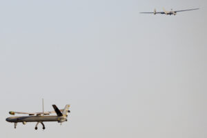 Elbit Systems Hermes 450 UAV in the front, IAI Heron 1 in the back